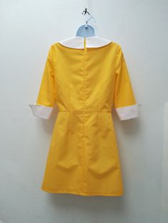 "ASHLEY DRESS Handmade dress 35%Cotton 65%Polyester Colors: yellow, white This dress is made under request, so there is no stock. Since is only made under request, can not be returned ( read my policies concerning conditions for exchanges or returns) CAN I CHANGE THE COLOR? YES Just add to your cart the listing special request, aswell for lining or other changes as alterations https://www.etsy.com/uk/listing/624364219/special-requests?ref=shop_home_active_1&frs=1 ARE YOU ON A RUSH? Do you ne Yellow Fitted Mod Dress, Yellow Cotton Retro Vintage Dress, Yellow Fitted Dress In 1950s Style, Fitted Yellow Dress In 1950s Style, Yellow Fitted Vintage Dress 1950s Style, Mondrian Dress, Mod Shift Dress, 60s Mini Dress, Mod Dress 60s