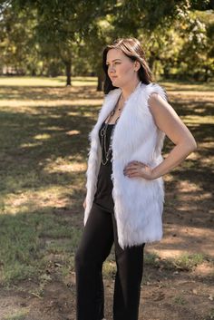 Classic and chic White Angora faux fur long vest with deep pockets on both sides and hidden hook and eye front closure. Extremely soft and luxurious high quality faux fur! Great fitting and easy to wear makes this the perfect way to add a little style to any dressy or casual attire. Fully lined with high quality satin. 100% high quality soft faux fur. Hand made in the USA. Sizes available in S, M, L, XL Hand wash cold, hang to dry. Most items from our shop ship within 1-2 business days. VIEW PIC Sleeveless Fur Coat With Faux Fur Trim For Fall, Sleeveless Fur Coat With Faux Fur Lining For Fall, Sleeveless Faux Fur Coat For Fall, Sleeveless Faux Fur Coat, Sleeveless Faux Fur Outerwear, Sleeveless Fur Coat With Faux Fur Trim, Sleeveless Faux Fur Coat With Fur Trim, Chic Faux Fur Vest For Fall, White Fur Vest