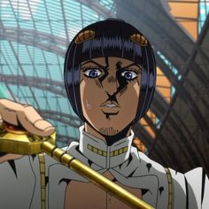 an anime character holding a golden object in his hand