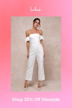 Any bride-to-be is guaranteed to start a trend with a voguish look like the Lulus Chic Vow White Satin Off-the-Shoulder Bow Jumpsuit! Sturdy woven satin shapes this stunning jumpsuit that starts with a princess-seamed bodice with supportive side boning, a sleek off-the-shoulder neckline (with hidden no-slip strips), and short puff sleeves with elastic at the shoulders and cuffs. The high, fitted waist tops slim-fitting, straight pant legs that finish at ankle-length hems. A dramatic, oversized b Glamorous Strapless Jumpsuit For Summer Formal Events, White Off-shoulder Evening Jumpsuits And Rompers, Chic Strapless Jumpsuit For Wedding Guests, White Off-shoulder Jumpsuits And Rompers For Evening, Chic Off-shoulder Jumpsuits And Rompers For Spring, Elegant Strapless Jumpsuits And Rompers For Spring, Chic Spring Wedding Jumpsuits And Rompers, Glamorous Spring Wedding Jumpsuit Or Romper, Fitted Jumpsuits And Rompers For Wedding Guest In Spring