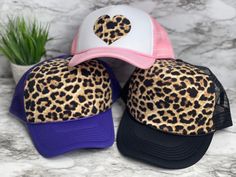 "These unique custom MADE TO ORDER hats are truely one of a kind. Not all heads are created equal , which is why we have so many size options. You can customize your hat color, size and your favorite design. please note all hat colors vary by size, in other words- not every hat color is available in every size. **please note these are made to order and the design layouts will be unique to each hat ordered** Please feel free to ask any questions you have about sizing, as these are MADE TO ORDER e Purple Hats As Gifts, Purple Hat As A Gift, Purple Cap As A Gift, Pink Baseball Cap As Gift, Trendy Customizable Baseball Cap For Gifts, Customizable Cute Trucker Hat For Gift, Customizable Trucker Hat For Gift, Trendy Personalized Trucker Hat As Gift, Trendy Gift Snapback Hat With Curved Bill