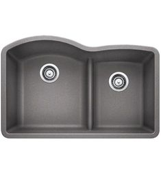 the double bowl granite kitchen sink has two faucets on one side and an undermount