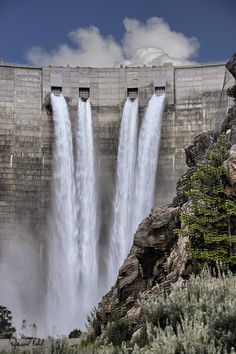 a large waterfall with water pouring out of it