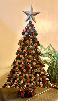 a christmas tree made out of bottle caps