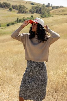 This simple sweater is one to keep your eye on. It's so easy to pair with all of your favorite bottoms, including our fav skirt! Featuring a ribbed neckline and small side slits, the Miles City Sweater is a piece you will have for years. medium weight // paired with the tiny perfect things midi skirt in black + hat coming soon! Spring Ribbed Relaxed Fit Cropped Sweater, Casual Ribbed Skirt With Relaxed Fit, Casual Non-stretch Tiered Mini Skirt, Spring Striped Cropped Sweater, Fitted Spring Sweater Dress, Mini Length, Baby Bow Hats, Simple Sweater, City Mom, Nursing Tank