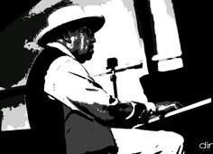 a black and white photo of a man with a hat on playing the piano in front of a microphone