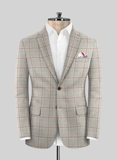 Indulge in the enduring charm of our Loro Piana Tana Wool Silk Linen Jacket, which seamlessly blends classic and contemporary styles. Expertly tailored from a luxurious blend of wool, silk, and linen, this stunning beige plaid jacket adds a fashionable touch to your next event. Our jacket makes a perfect addition to your wardrobe, allowing you to make a lasting impression.  Loro Piana Proposte Giacche Spring Summer collection is elegant and comfortable; the fabrics are made from various material