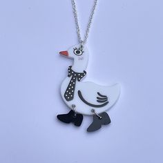 Cute and funky duck pendant on an 18inch silver plated chain, adorable novelty necklace perfect for duck lovers. Great novelty Easter gift.  Not suitable for young children due to choking hazard   Please use code SAVE10 when purchasing 5 items from my store for 10% off Fun White Necklaces For Gifts, Silver Fun Necklace For Gift, Fun Silver Necklace For Gift, Novelty Necklace, Duck Pendant, Duck Necklace, Quirky Jewelry, Christmas Earrings, Secret Santa Gifts