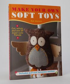 the cover of make your own soft toys with an owl hanging from it's back