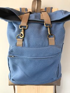 Going on an adventure? Are you off to class? Or on the go with a baby in tow? Travel about with style and comfort! Our new fold-over backpack features a fold-down flap, double claw hook closures, adjustable straps, and an outside zippered pocket. This new edition features a vegan leather bottom and taller side pockets for water bottles. Each backpack is made from quality upholstery material adding strength and durability. This trendy backpack is a must-have! When you make a purchase from Gift of Going On An Adventure, Trendy Backpacks, Positive Influence, Made Goods, Dusty Blue, Upholstery Fabric, Amazing Jewelry, Inside Pocket, Jewelry Shop