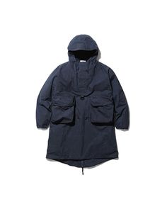 The Indigo C/N Anorak is a lightweight overcoat. The fabric is a cotton and nylon blend. The Indigo C/N Anorak features a hood with a drawcord, half-zip closure, a D ring, two bust pockets, and a fishtail hem. The Indigo C/N Anorak is designed with a looser fit, with the hem hitting just above the knee. We recommend taking your normal size for an oversized fit. The model stands 6' and wears size M. Long Parka, Snow Peak, Customer Stories, Anorak Jacket, The C, History Design, D Ring, Above The Knee, Half Zip