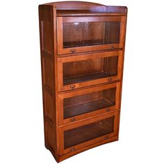 a wooden bookcase with three shelves on each side and four drawers on the other