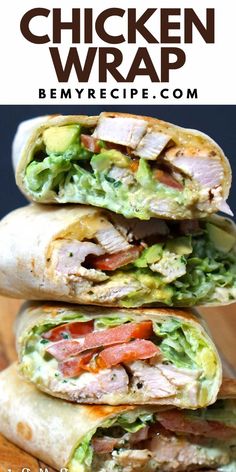 chicken wrap with lettuce and tomatoes on it