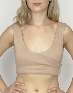 This item fits various body shapes. Perfect for regular everyday use and also as adaptive clothing!Highlights:# Regular Fit. # Fabric cotton with stretch, that is very soft#Wrap design with Velcro#Back support layer#Cute lace trim on the bottom hem and around the neckline#Openings for the bra pads for bust support#Inner elastic that helps bra top stay in place, even if lifting hands up# Made in India#Perfect to wear at home, sleep, exercise. Fitted Beige V-neck Crop Top, Fitted Beige Cotton Crop Top, Beige Fitted Cotton Crop Top, Stretch Low-cut Bra Friendly Top, Stretch Low-cut Tops Bra Friendly, Low-cut Fitted Tops With Bra Friendly Design, Fitted Low-cut Tops With Bra-friendly Design, Fitted Low-cut Crop Top For Yoga, Low-cut Tops With Built-in Bra For Yoga