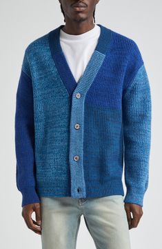 Hand-knit using surplus and scrap yarns, this cardigan crafted with soft wool features tonal colorblocking and a true one-of-a-kind look. Front button closure Ribbed cuffs and hem Blue cardigan is 73% wool, 17% viscose, 7% nylon, 3% cashmere; white cardigan is 54% wool, 20% viscose, 8% nylon, 6% acrylic, 4% polyester, 3% cashmere, 3% linen, 2% mohair Hand wash, dry flat Imported Designer Clothing Due to the handmade nature and the use of different combinations of leftover yarns, each truly one-a Yarn Project, Color Block Cardigan, Wearable Blanket, Blue Cardigan, Yarn Projects, White Cardigan, V Neck Cardigan, Wool Blend Sweater, Soft Wool