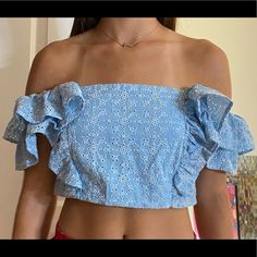 Bcbgeneration Blue Ruffled Crop Top, Size Small. The Top Has Flower Like Designs Embroidered On And It Can Be Worn On Or Off-Shoulder. The Back Has A Stretchy Material Used To Fit Your Body. The Shirt Still Has The Tags And Hasn’t Been Worn Before. It Is In Very Good Condition. For Reference, The First Two Pictures Are The Shirt On Me And I Am 5’6” And About 125lbs And Wear A Size Small- Extra-Small. If You Have Any Questions Please Comment And I Will Answer Asap. I Also Accept Offers!! Spring Ruffled Crop Top For Day Out, Spring Day Out Crop Top With Ruffles, Spring Ruffled Crop Top For Brunch, Spring Vacation Crop Top With Ruffles, Blue Ruffled Tops For Spring, Spring Ruffle Crop Top For Brunch, Blue Spring Crop Top For Brunch, Spring Crop Top With Ruffles, Trendy Blue Crop Top For Spring