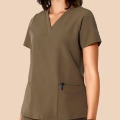 - New-Nwt - Size: L - Color: Truffle (Brown) - Detail: Notch V-Neck Cut - Short Sleeves - Relaxed Fit - Front Slip Pockets - Measurement Approx: - Flat Pit2pit: 22" - Full Length: 26.5" Great Condition No Price Is Final Feel Free To Make An Offer Please Look At All Photos. First & Last Photo Is For Optics Of Advertisement. Sale Item Slightly Different. Disclaimer: Item(S) Are Represented To The Best Optics/Photos And Description Required For This Platform. Any Noticeable Flaws Are Noted In The D Utility Workwear Tops With Multiple Pockets, Utility Workwear Tops With Side Pockets, Khaki Tops With Side Pockets For Work, Khaki Utility Tops With Pockets, Green V-neck Tops With Pockets, Green V-neck Top With Pockets, Solid Color Tops With Pockets For Work, Satin Tank Top, Elf Shirt