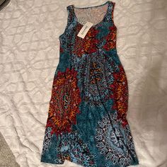 Nwt - Boho Dress. Never Worn, Hippie And Really Cute. Could Be A Sun Dress Or Pool Color. Bundle & Save! Casual Orange Dress With Vibrant Print, Bohemian Sleeveless Midi Dress In Multicolor Print, Casual Midi Sundress With Vibrant Print, Bohemian Sleeveless Multicolor Midi Dress, Casual Sleeveless Midi Dress With Vibrant Print, Casual Multicolor Knee-length Sundress, Casual Multicolor Sundress With Colorful Pattern, Casual Blue Maxi Dress With Vibrant Print, Casual Multicolor Patterned Sundress