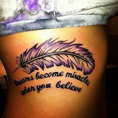 a woman's stomach with a tattoo that says dreams become much, when you believe