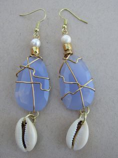 Aqua Chalcedony and freshwater pearl earrings with cowrie shells. Unique Blue Jewelry For Vacation, Unique Blue Jewelry For The Beach, Vacation Blue Jewelry With Natural Stones, Blue Natural Stone Jewelry For Vacation, Unique Teardrop Jewelry For Beach, Blue Natural Stones Jewelry For Vacation, Blue Shell Jewelry As A Gift, Mother Of Pearl Drop Earrings For Beach, Bohemian Mother Of Pearl Earrings For Beach