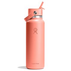 the hydro flask water bottle is pink with a straw in it's mouth