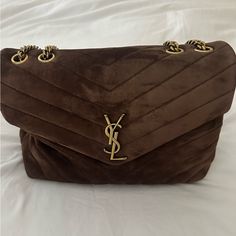 New/Never Worn Loulou Medium Ysl Shoulder Bag In Brown Suede. Includes Tags And Dust Bag. Saint Laurent "Loulou" Shoulder Bag In Y-Quilted "Softy" Suede. Sliding Chain/Leather Shoulder Strap May Be Doubled; 9.8"-19.3" Drop. Envelope Flap With Signature Ysl Hardware. Bronze Hardware. Interior, Two Main Compartments Separated By A Zip Pouch; One Zip Pocket Approx. 8"H X 11.5"W X 4"D. Ysl Bag Brown, Ysl Suede Bag, Ysl Loulou Bag, Ysl Shoulder Bag, Bag Saint Laurent, Dream Bags, Bronze Hardware, Material Girl, Saint Laurent Bag