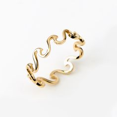 1- P R O D U C T ∙  D E S C R I P T I O N Presenting the Wave Band Ring in 14K Solid Gold, an exquisite piece of nature-inspired jewelry for women. This dainty ocean wave stacking ring is a perfect gift for her, symbolizing strength and tranquility. Handcrafted with love, it adds a touch of elegance to any outfit. Experience the allure of the ocean, captured in 14k yellow gold. Ideal for nature lovers and fashion-forward individuals. 2- P R O D U C T ∙  D E T A I L S Gold material: 14K solid gold Choice of gold color: Yellow gold, Rose gold, White gold Choice of ring size: - 5 US/CA - 5 1/4 US/CA - 5 1/2 US/CA - 5 3/4 US/CA - 6 US/CA - 6 1/4 US/CA - 6 1/2 US/CA - 6 3/4 US/CA - 7 US/CA - 7 1/4 US/CA - 7 1/2 US/CA - 7 3/4 US/CA - 8 US/CA - 8 1/4 US/CA - 8 1/2 US/CA - 8 3/4 US/CA - 9 US/CA Di Gold Wavy Rings For Gifts, Wavy Gold Rings For Gift, Modern Twist 14k White Gold Jewelry, Gold Wavy Rings For Anniversary, Gold Wavy Promise Ring, Modern Wavy Jewelry For Anniversary, 14k Gold Wavy Rings, Modern Jewelry For Anniversary, Wavy 14k Gold Rings