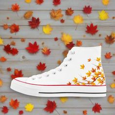 The "Aki" high top canvas shoes are a stunning and stylish choice for those who want to embrace the beauty of autumn and Japanese culture in their footwear. Inspired by the vibrant hues of fall, these shoes feature a design that captures the essence of Japan's iconic autumn foliage. The canvas material is adorned with patterns of maple leaves and branches, creating a warm and eye-catching look. The lace-up closure and padded ankle support ensure comfort and security, while the high top design pr Shoes For Him, Fall Converse, Women High Top Sneakers, Painted Converse, Autumn Shoes, Style Converse, Trendy Shoes Sneakers, Harry Potter Merchandise, Kawaii Shoes