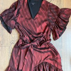 Only Worn Twice! Amazing, Brand-New Condition. Red Mini Dress With Ruffle Hem For Party, Red Mini Dress With Ruffle Hem For Night Out, Red Ruffle Hem Evening Dress, Red Evening Dress With Ruffle Hem, Red V-neck Mini Dress With Ruffle Hem, Red Knee-length Dress With Ruffle Hem, Burgundy Ruffled Dress For Night Out, Red Holiday Dress With Ruffle Hem, Red Ruffle Hem Dress For Holidays