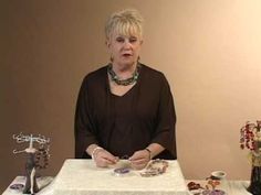 a woman sitting at a table with plates on it