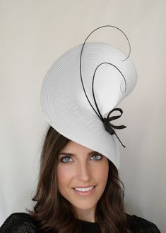 Elegant Black and white wedding fascinator hat Bride. This white fascinator hat is decorated with two black feathers that create an original draw and a black bow. It is a beautiful woman hat perfect for Special Occasion like weddings, Royal Ascot horse races, cocktails, Kentucky Derby, Tea Party, Baptism... This wedding hat is mounted on a headband that allows to tilt the hat to the liking of each one. If you would like to change any colors or items of the hat please contact us to meet your need Fitted White Mini Hat For Evening, Fitted White Headpiece For Church, Fitted White Headpiece For Party, White Fitted Headpiece For Party, Chic White Fitted Costume Hats And Headpieces, Elegant White Costume Hats And Headpieces For Evening, Elegant White Party Costume Hats And Headpieces, White Hats For Kentucky Derby Evening, Elegant White Evening Costume Hats And Headpieces