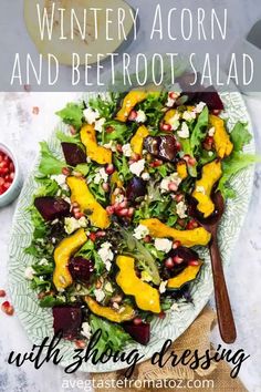 a salad with beets and feta cheese on top is shown in this image