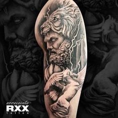 a man's arm with tattoos on it and an image of a lion holding a bird