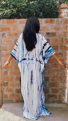 "All dresses are custommade- ONLY FOR YOU! Kaftan,RAYON Caftan, Long Robe, Summer Dress, Long Maxi, Loungewear, beachwear, Maternity Dress, Holiday, Vacation Wear The beauty of this kaftan is - -This lovely tie-dyed Indian kaftan is perfect for the poolside, beach or cruise holiday , anniversary gifts or as lounge wear. -It is Blue-turquoise-white-Indian hand tie-dyed - as pictured. Measurements- High quality soft rayon- not transparent! Width- Chest:waist: Hips - 68 inches around - FITS UPTO US Oversized Long Bohemian Dress, Oversized Maxi Dress For Festivals, Blue Batik Print Beach Kimono, Traditional Maxi Dress With Kimono Sleeves For Festival, Beach Blue Batik Print Kimono, Festival Maxi Length Kimono Free Size, Free Size Maxi Thobe For Beach, Free-size Maxi Thobe For Beach, Beach Thobe In Free Size Maxi Length