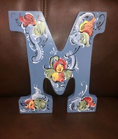 "Need a unique wedding or house warming gift? How about a teacher present for the end of the year? New baby? Get a Norwegian Rosemaled letter! Measures 9\" and 1/2” thick, and can be hung on a wall or leaned up on a shelf or mantle. Painted in acrylics and sealed with an indoor/ outdoor sealer. Makes a great nursery decoration too!! Several color choices available, or I can coordinate to your decor! | Norwegian Rosemaled Wood Letter" Wood Letter, Presents For Teachers, Wooden Letter, Painted Letters, Pretty Christmas, Tole Painting, Letter Sign, Wood Letters, End Of The Year