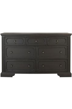 a large black dresser with drawers on it