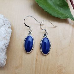 Visit our on-line shop at: Etsy.com/shop/AlbuquerqueDesigns *sterling silver earrings *dangle earrings *classic bezel settings *lapis blue stone *stone size: 14x7mm oval *these items are made to ship, slight variations in stones will occur *handcrafted in Albuquerque, New Mexico, USA *free convenient gift box *free shipping in USA *ready to ship Keywords: #SoCute925 Visit shop: AlbuquerqueDesigns.etsy.com Classic Blue Earrings As Gift, Sapphire Sterling Silver Drop Earrings, Classic Blue Hypoallergenic Jewelry, Blue Oval Nickel-free Earrings, Hypoallergenic Sapphire Dangle Earrings, Blue Nickel Free Sterling Silver Earrings, Blue Sterling Silver Drop Earrings, Nickel-free Blue Sterling Silver Earrings, Blue Nickel-free Sterling Silver Earrings