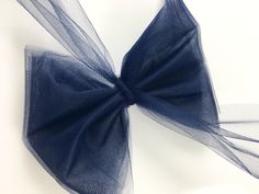 a blue bow on a white background