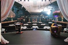 the inside of a restaurant with tables and chairs