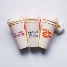 three coffee cups sitting next to each other on a white surface with the words, but first, sip back and relax