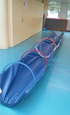 an inflatable snowboard laying on the floor