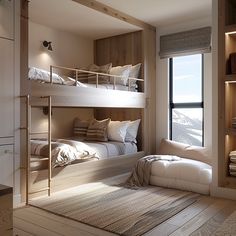 a bedroom with bunk beds and pillows on the floor, in front of a window