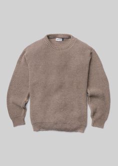 This is not a blend. An alpaca's coat provides superior performance in dense climates, for every season. The Alpaca Sweater is ultimately resistant to humidity and chill – a quality that can't be replicated with other yarns.Superfine alpaca wool is at least 50% softer than traditional wool due to its smoother individual strands. Knit together by a familiar shaker stitch, this sweater is an excellent insulator with each rib blending into a plush hand.Please be aware of a .5" tolerance for slight Knitted Sweaters Men, Alpaca Coat, Wool Knit Sweater, Wool Sweater Men, Alpaca Sweater, Alpaca Yarn, Casual Sweater, Men In Uniform, Chunky Knits Sweater