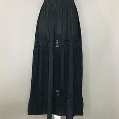 Mexican Artisanal Skirt - One Size (S/M) - Black Artisanal Skirt Made In Oaxaca, Mexico, With Elastic On The Waist. (There May Be Some Variations In The Color Depending On The Brightness Of Your Screen). Fabric: Manta Summer Black Cotton Maxi Skirt, Black Cotton Maxi Skirt For Summer, Black Dress With Relaxed Gathered Skirt, Black Dress With Gathered Relaxed Skirt, Black Dress With Gathered And Relaxed Skirt, Black Gathered Beach Skirt, Black Cotton Maxi Skirt With Elastic Waistband, Black Cotton Maxi Skirt Relaxed Fit, Black Cotton Skirt For Festival