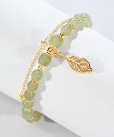 Beautiful Green 18K Gold Inlaid Jade Zircon Leaf Charm BraceletMade of fine 18K Gold Inlaid Jade Zircon Leaf.Length: 17cm/6.63". Matches easily with daily hairstyle, dresses & Shirts High Waisted Denim Skirt, Daily Hairstyles, Silk Cardigan, Tassel Drop Earrings, Leaf Charms, Fall Skirts, Silk Printing, Bracelet Making, Army Green