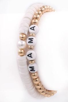 Disc Bead MAMA Stretch Bracelet Set (2 Colors) – Mota Boutique Trendy White Stretch Bracelet For Mother's Day, Bohemian White Bracelets For Mother's Day, Adjustable Round Heishi Beads Bracelet, Adjustable Heishi Beads Bracelet, White Casual Stretch Bracelet For Mother's Day, Casual White Stretch Bracelet For Mother's Day, Beaded Letter Bracelets For Beach, Beaded Bracelets With Letter Beads For Beach, Casual Stretch Bracelet With Round Beads For Mother's Day