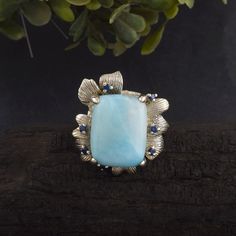 Natural Larimar Ring, 925 Sterling Silver Ring, Women Ring, Bohemian Ring, Blue Gemstone Ring, Ocean Larimar Ring, Birthday Gift for her ✦ PRODUCT DETAILS ✣ Product Weight:--------10.10 grams (Approx.) ✣ Metal:----------------------925 Sterling Silver ✣ Finish:---------------------Oxidized ✣ Stone:---------------------Larimar ✣ Stone Size:---------------18 x 14 mm, 1.5 mm ✣ Stone Shape:------------Rectangle, Round ✣ Ring Size:-----------------All Size Available ✣ Ring Dimension:--------27 x 24 x Blue Gemstone Ring, Friendship Day Gifts, Blue Gemstone Rings, Larimar Ring, Larimar Rings, Bohemian Ring, Bohemian Rings, Ring Blue, Women Ring