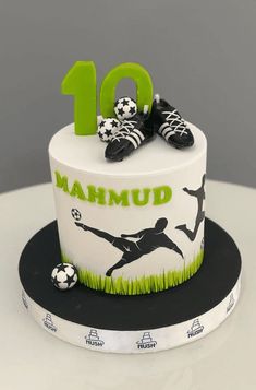 a soccer themed birthday cake with the number ten on it