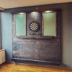 a dart board mounted to the side of a wall