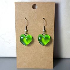 These gummy heart earrings are perfect to bring you back to your childhood! They come in any color of the rainbow, so you can be sure to get the color you like! They are made with sterling silver hooks to ensure that your ears are not affected! Green Heart Beads Earrings For Gift, Green Earrings With Heart Beads For Gifts, Trendy Heart Drop Earrings As Gift, Trendy Heart-shaped Earrings For Gifts, Trendy Heart Shaped Earrings For Gifts, Green Heart Drop Earrings For Gifts, Green Heart-shaped Earrings For Valentine's Day, Trendy Heart Earrings For Pierced Ears As Gift, Trendy Heart Earrings For Gift